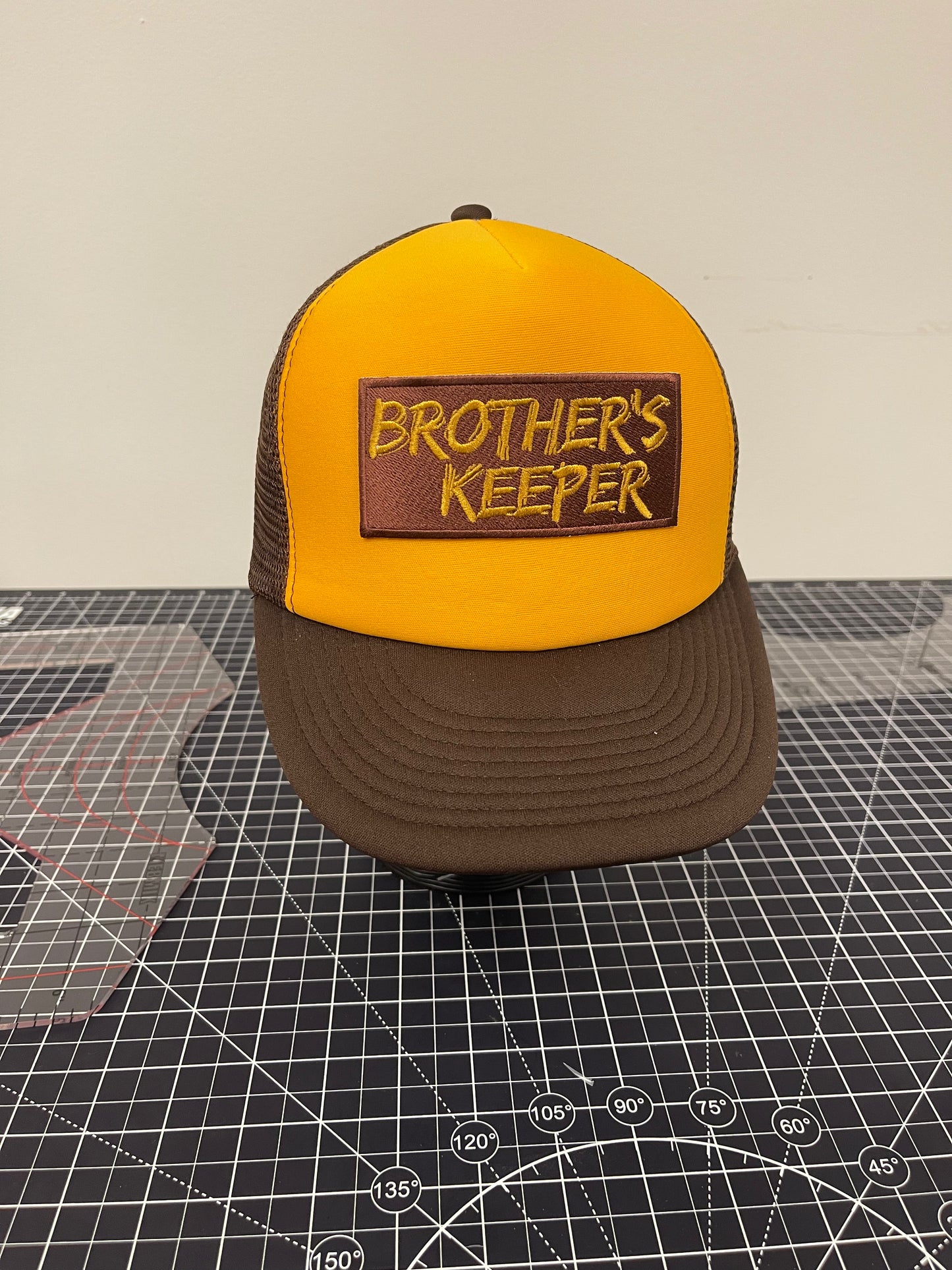 Brother’s Keeper Trucker Hat – Gold/Brown Edition