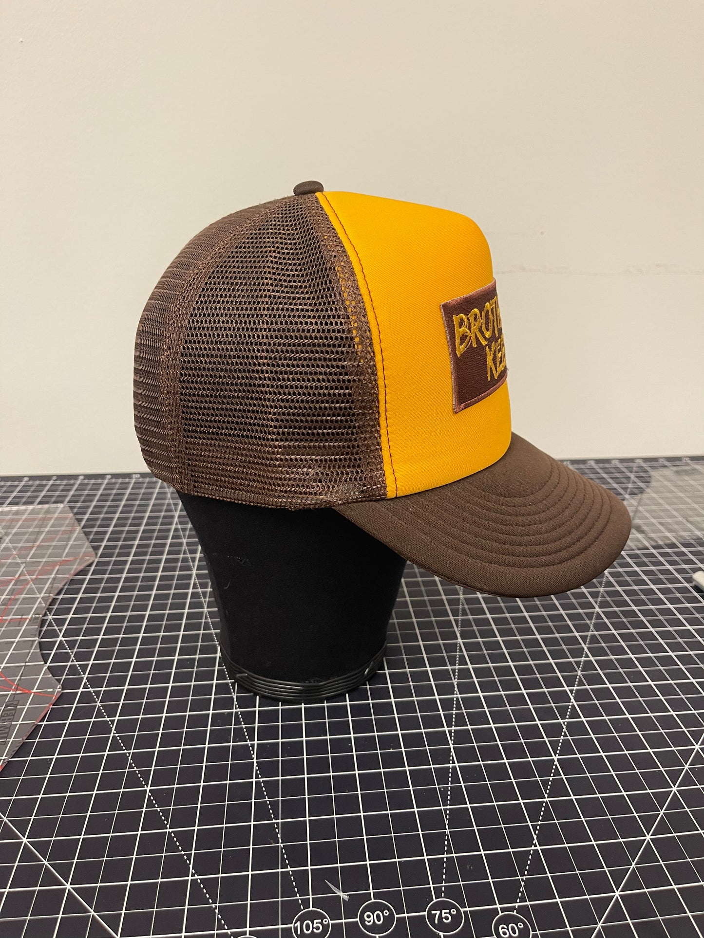 Brother’s Keeper Trucker Hat – Gold/Brown Edition