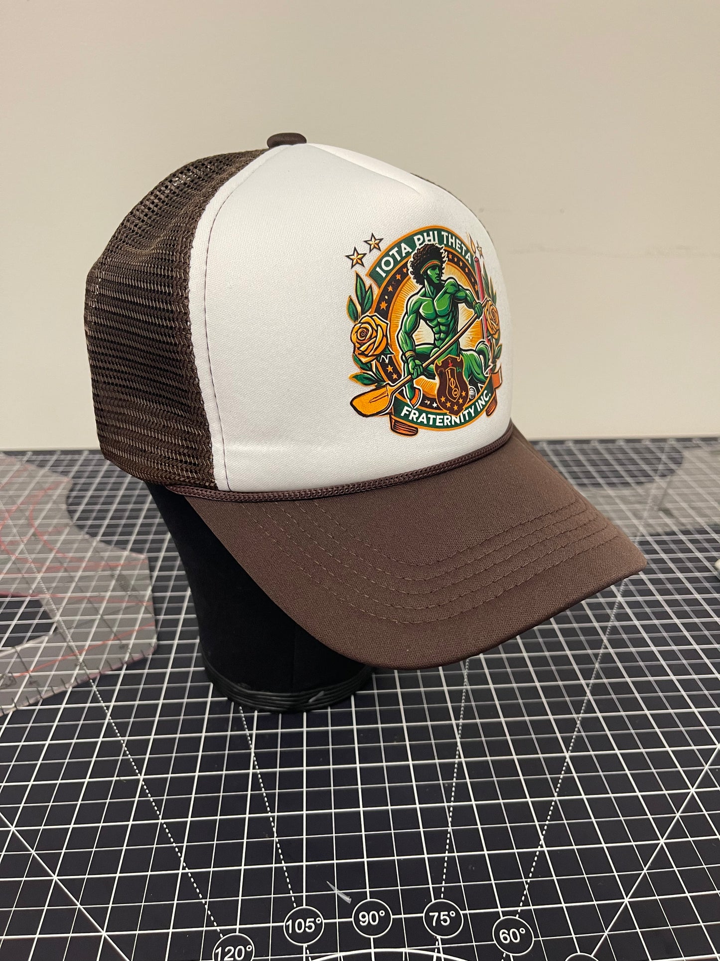 Iota Warrior Seal Trucker Hat – White/Brown Edition