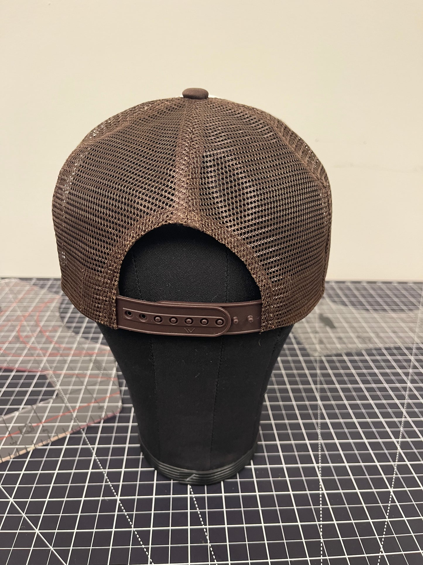 Iota Warrior Seal Trucker Hat – White/Brown Edition